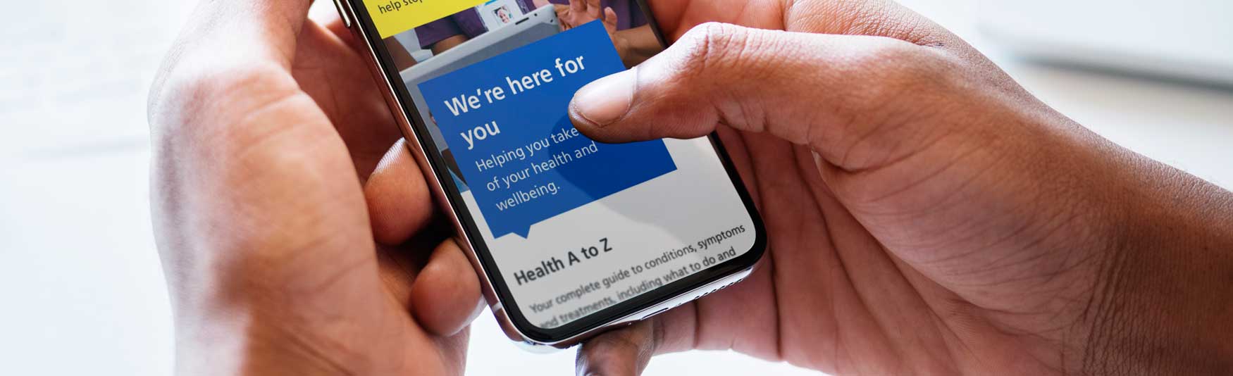 Person searching for NHs Services on a mobile phone